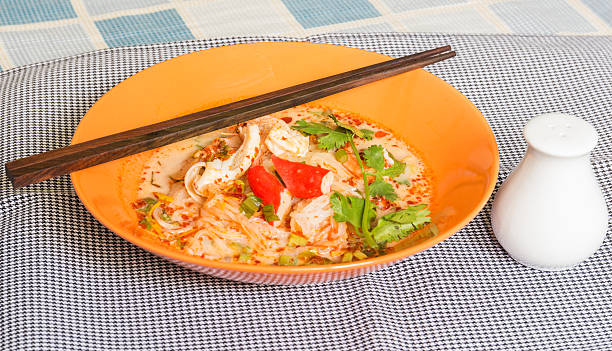 istock Tom Yum Seafood Noodle in Orange Bowl 180903270
