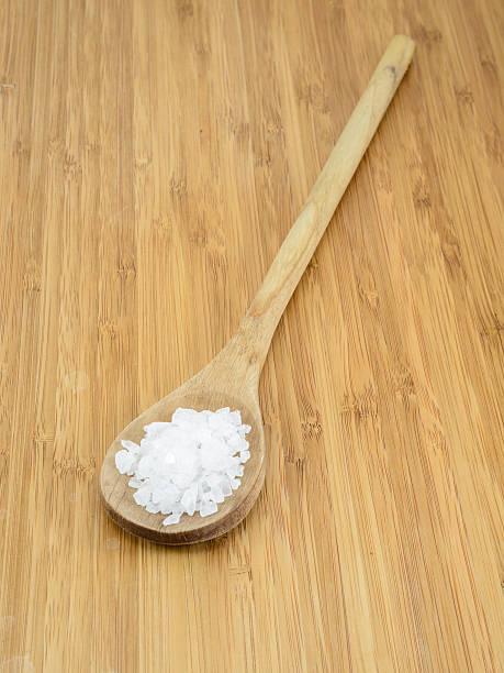 istock Sea Salt in Wooden Spoon 180903494