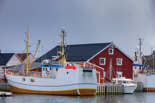 fishing boats in a harbour on the Lofoten islands in Norway