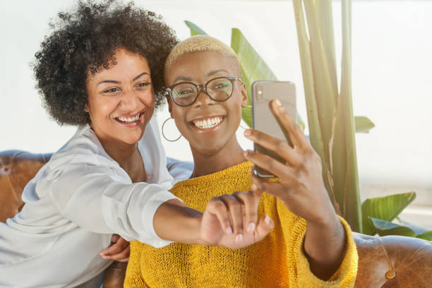 istock Smiling multiracial women taking selfie on smartphone 1809052285