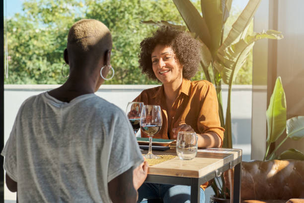 istock Diverse female friends resting in restaurant 1809054366
