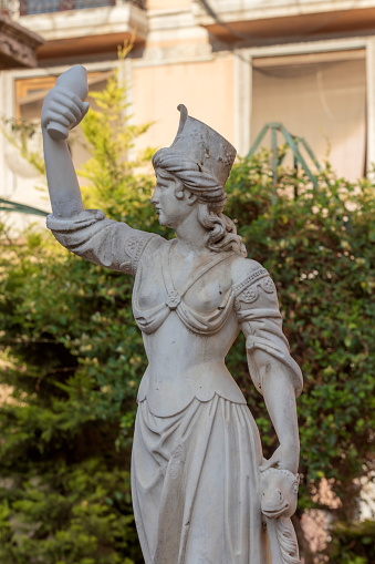 Valencia, Spain - May 5, 2023: statue of a female in a small public garden on Plaza Don Joan de Vila-rasa in Valencia