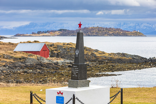 Trondenes, Norway - April 20, 2023: Monument to Red Army prisoners of war next to Trondenes church just outside Harstad. During the war, up to 1,200 Russian prisoners of war were crammed into a camp. They had been brought here to build the nearby coastal bunkers for the German army