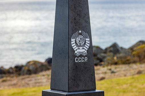 Trondenes, Norway - April 20, 2023: Monument to Red Army prisoners of war next to Trondenes church just outside Harstad. During the war, up to 1,200 Russian prisoners of war were crammed into a camp. They had been brought here to build the nearby coastal bunkers for the German army