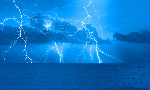istock Beautiful landscape with lightning over the calm sea 1809067396