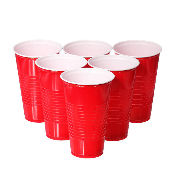 istock Beer pong. Red plastic cups isolated 180907624