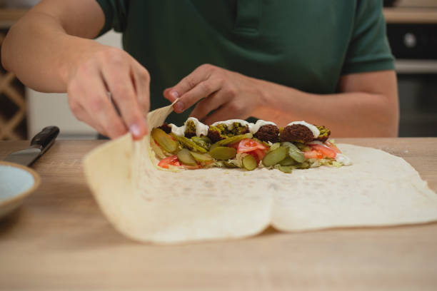 istock Man cooking homemade falafel meal. 1809102525