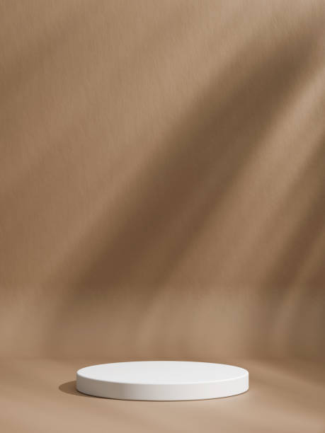 istock Minimalist white podium design on brown background with leaf shadow 1809107311