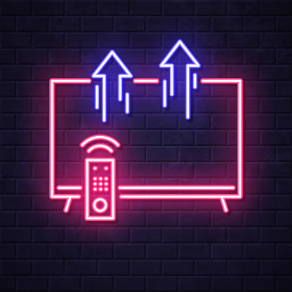 istock Send from TV. Glowing neon icon on brick wall background 1809118848