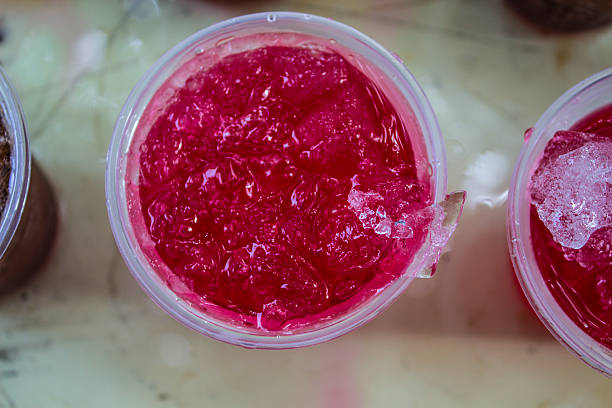 istock red coctail drink with ice cubs 180912718