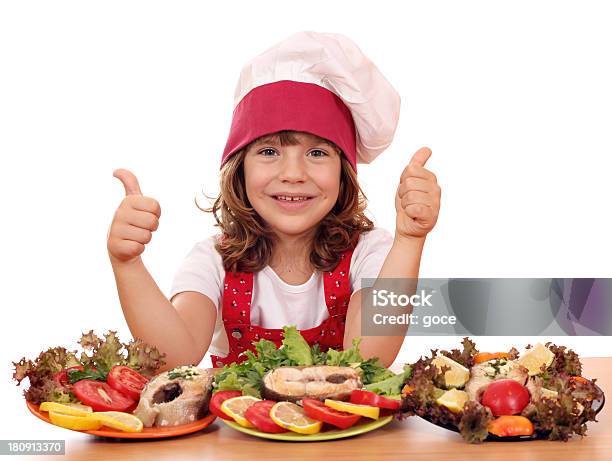 Happy Little Girl Cook With Seafood And Thumbs Up Stock Photo - Download Image Now - Beautiful People, Beauty, Cheerful