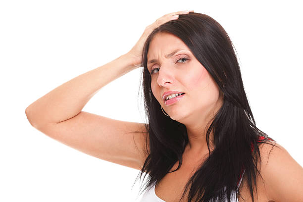 istock Latin woman suffering from headache 180913847