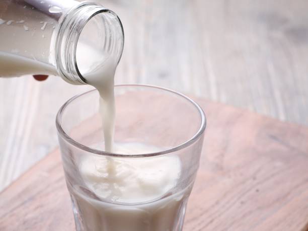 istock fresh milk in clear glass on the table 1809138835