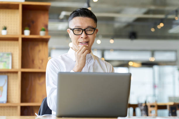 istock Asian businessmen having an online meeting 1809140433
