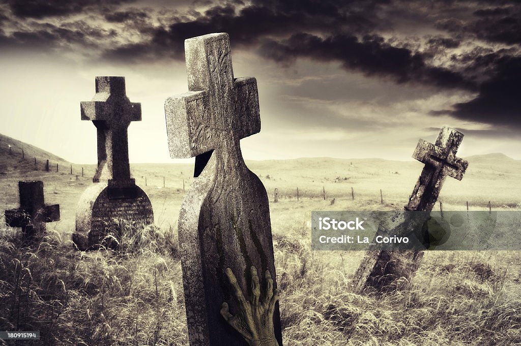 Zombie hand scratching marks on tombstone Halloween concept Scratched Stock Photo