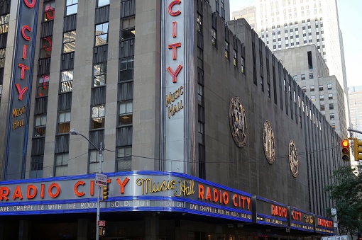 New York, United States – September 28, 2013: A closeup of the New York, Radio city concert hall building on Broadway streets during the day