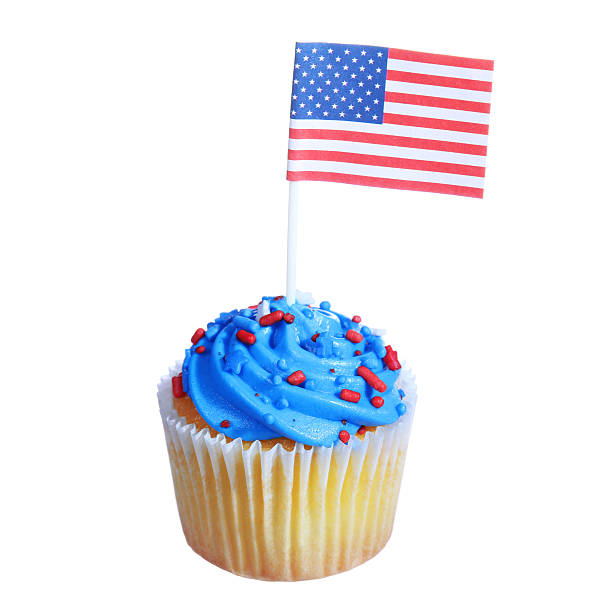 istock Patriotic cupcake with American Flag and sprinkles on top, isolated 180918285