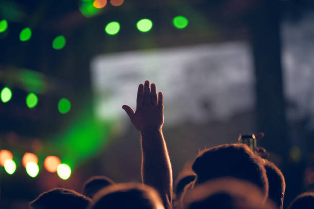 istock De-focused concert stage with laser lights and beams. 1809189923