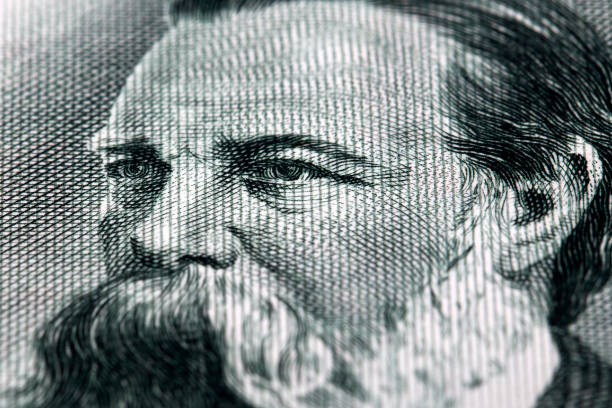 Friedrich Engels a closeup portrait from German money Friedrich Engels a closeup portrait from German money - Mark friedrich engels stock pictures, royalty-free photos & images