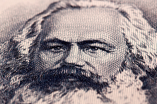 Karl Marx a closeup portrait from old German money - Mark