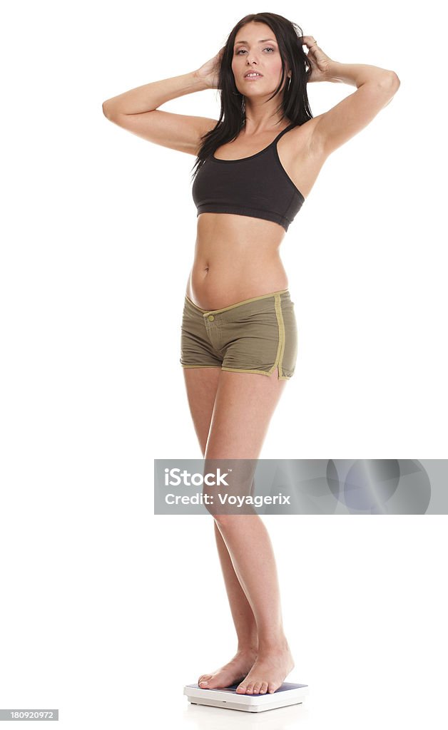 Perte de poids femme sur le pèse-personne heureuse concept de remise en forme. - Photo de Adulte libre de droits