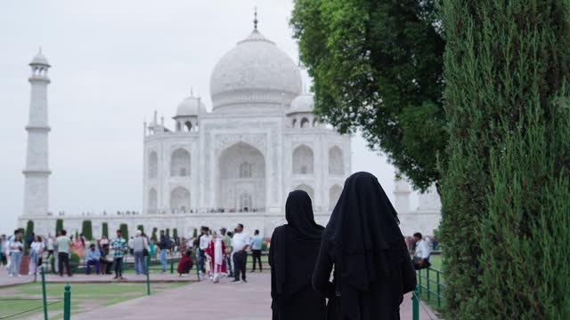 Muslim women watching Taj Mahal