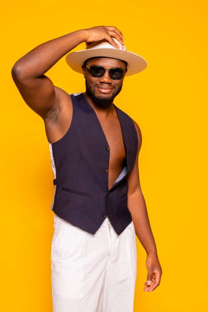 istock Young african stylish man wears hat and vest at studio 1809221216
