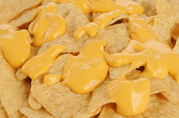 istock Tortilla chips and cheese closeup 180923562