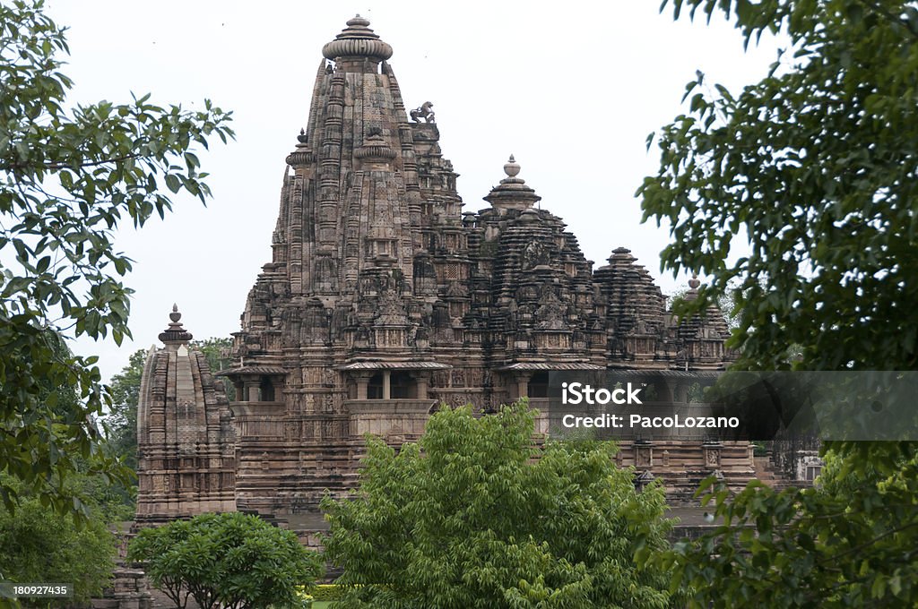 Erotica Tempio indù a Khajuraho, India - Foto stock royalty-free di Antica civiltà