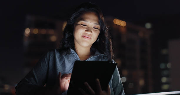 istock Night balcony, tablet or city woman typing social network feedback, customer experience or e commerce. Brand monitoring data, website research or Asian media worker analysis of online survey review 1809277932