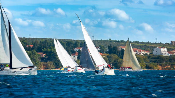 istock Sailing crews on sailboats on regatta 1809281853