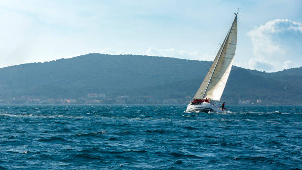istock Sailing crew on sailboat on regatta 1809282393