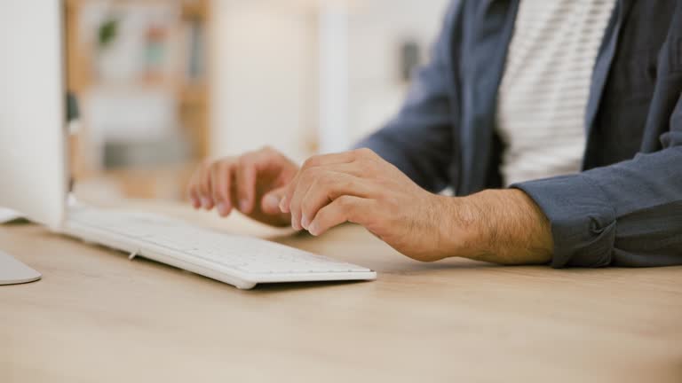 Hands, businessman at desk with computer and typing for market research for online article, review or feedback. Writing email, website search and man in office working on business development report.