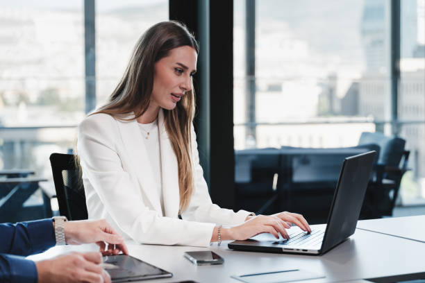 istock Businesswoman working using her laptop computer in the office 1809295964