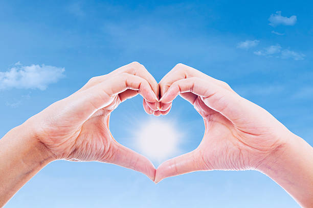 istock Hand gesture of love and sun 180931398