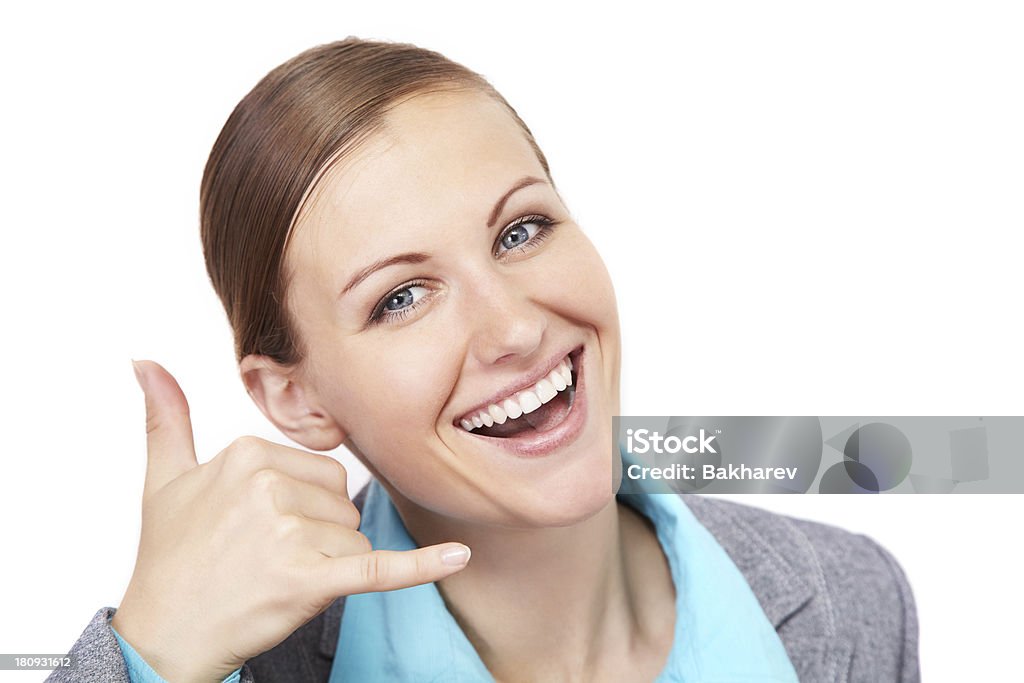 businesswoman gesture smiling businesswoman making a call me gesture, isolated over white background Adult Stock Photo