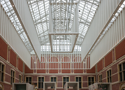 Amsterdam, Netherlands - April 21, 2023: Rijksmuseum, the original interior courtyards have been redesigned to create the imposing new entrance space of the Atrium. Amsterdam, Netherlands