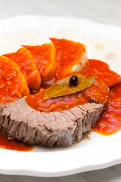 istock beef meat with tomato sauce and dumplings 1809327301