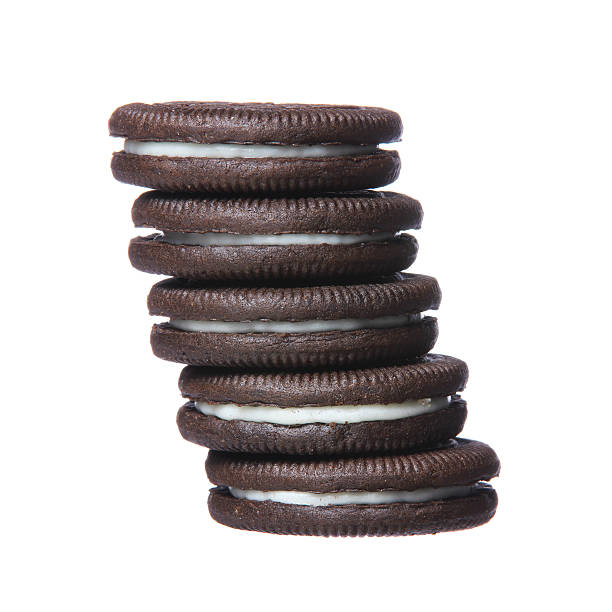 istock Chocolate cookies with cream filling tower isolated 180933728