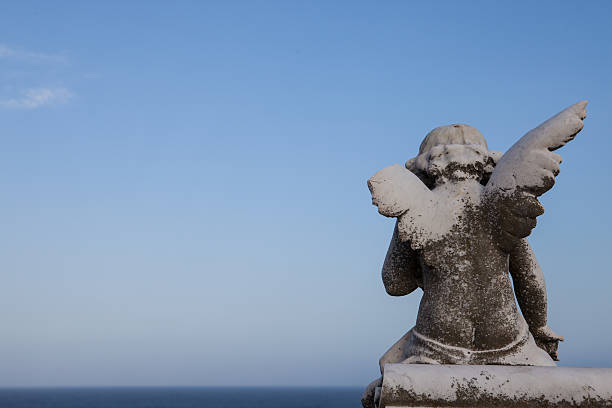 istock Angel monument overlooking the sea 180934340