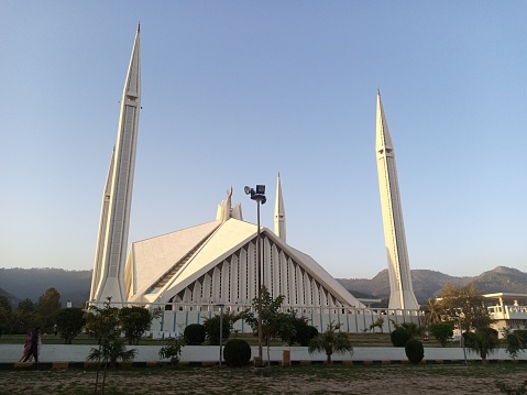 The Faisal Mosque is the national mosque of Pakistan, located in the capital city, Islamabad. It is the fifth-largest mosque in the world and the largest within South Asia, located on the foothills of Margalla Hills in Islamabad. It is named after the late King Faisal of Saudi Arabia.