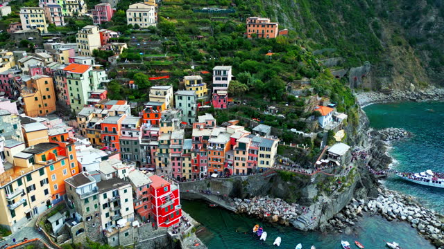 Aerial view Real time Footage of Riomaggiore Village one of the five villages in Cinque Terre, La Spezia province, Liguria, Italy,