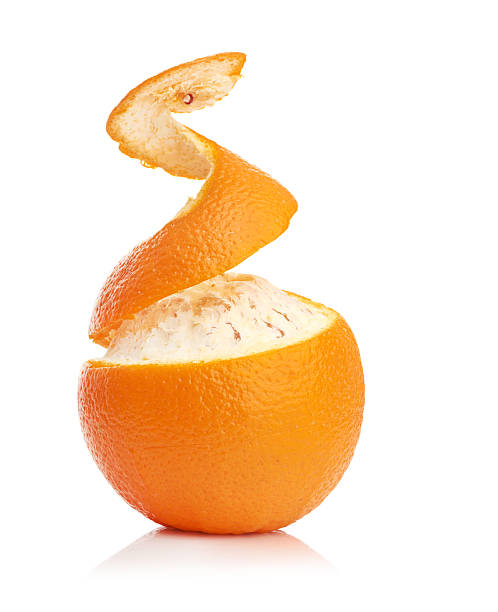 istock orange with peeled spiral skin 180935727