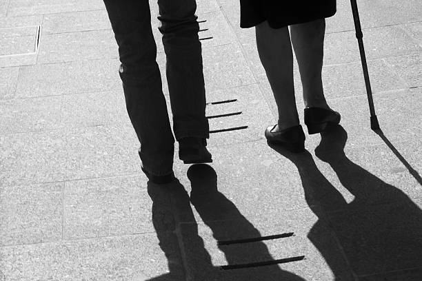istock Young and elderly ladies walking 180935968