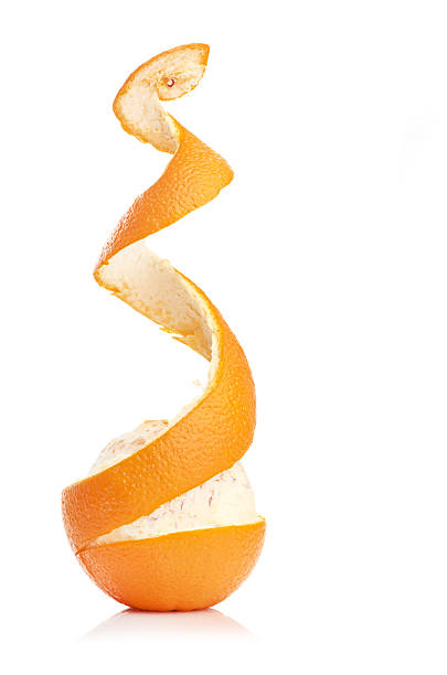 istock orange with peeled spiral skin 180936148