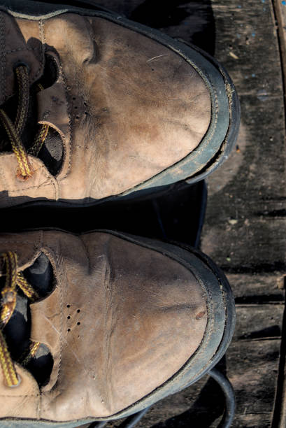 istock A pair of worn old brown leather boots 1809361878