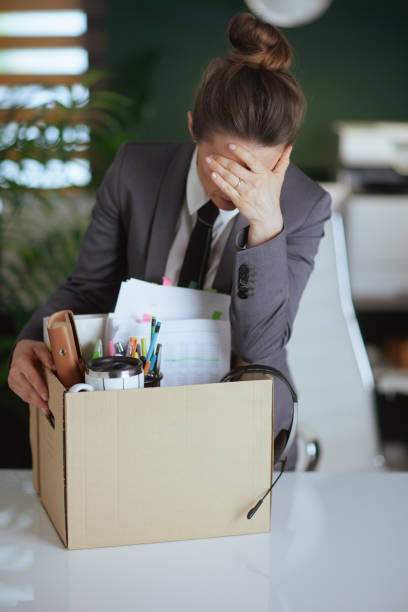istock sad modern female employee in modern green office 1809385575