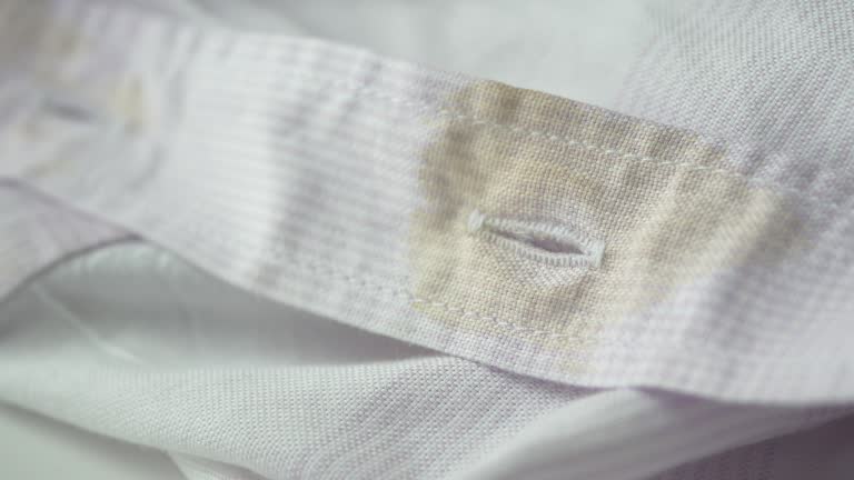 spilled coffee on a white shirt