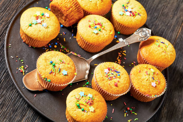 istock sweet lemon muffins on black plate, top view, close-up 1809386640