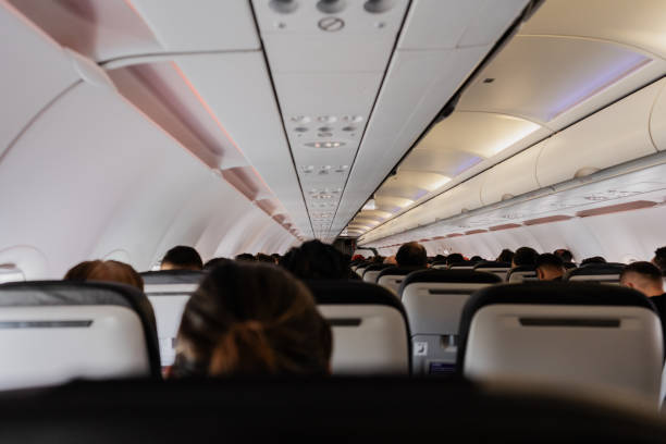 istock People inside of a airplane 1809405041